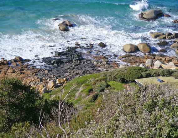 The False Bay Dolerite Dyke Swarm This black igneous rock, which is 130-million-years old, has intruded the older rocks when the Supercontinent Gondwana broke up. These dykes, with magnetic material, have helped map continental drift. Examples are found at Smitswinkel Bay and Dias Beach.  